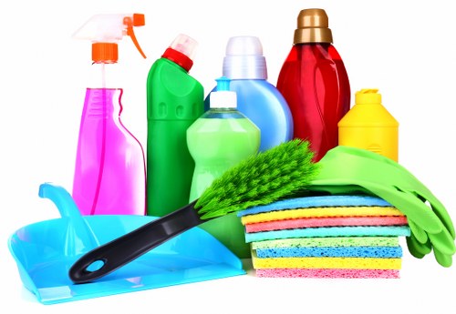 Cleaners Belgravia team member preparing safe cleaning equipment and PPE