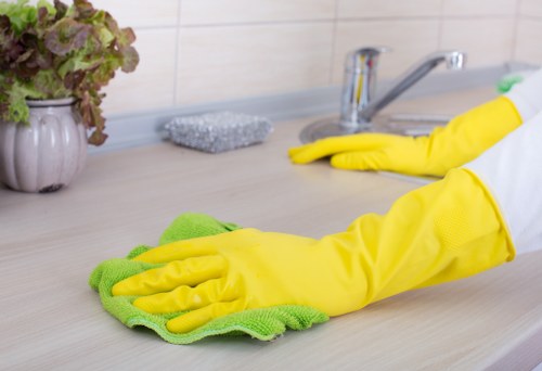 Professional cleaners beginning a detailed cleaning service in a Belgravia home