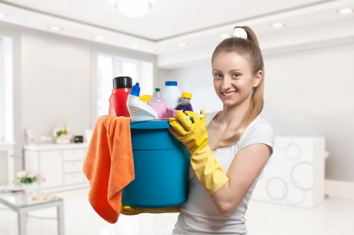 Local cleaners working carefully in a Belgravia townhouse interior